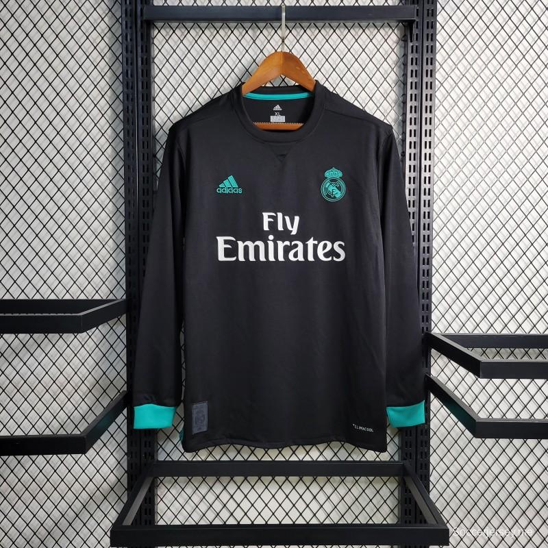 قميص ريترو بأكمام طويلة 17-18 ريال مدريد ذهاباً وإياباً أسود اللون
