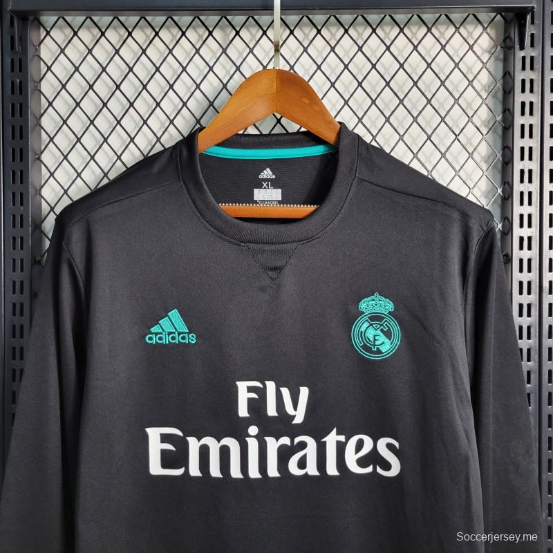 قميص ريترو بأكمام طويلة 17-18 ريال مدريد ذهاباً وإياباً أسود اللون
