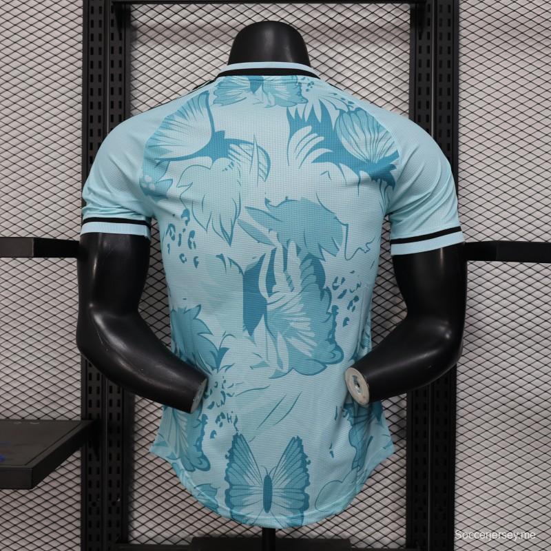 نسخة اللاعب 2025 قميص الجزائر أزرق فاتح بنقشة أوراق الشجر الاستوائية