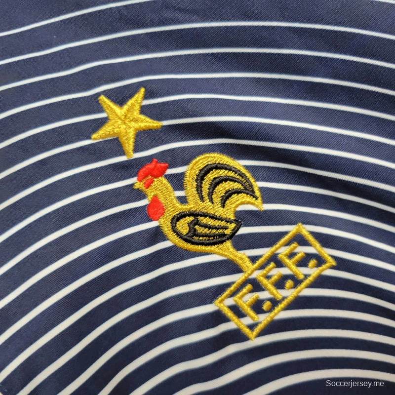 2025 جاكيت فرنسا 2025 سترة واقية مخططة أزرق/أبيض