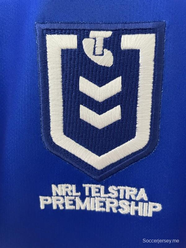 25/26 قميص كانبيرا رايدرز أبيض بخطوط زرقاء وخضراء وذهبية