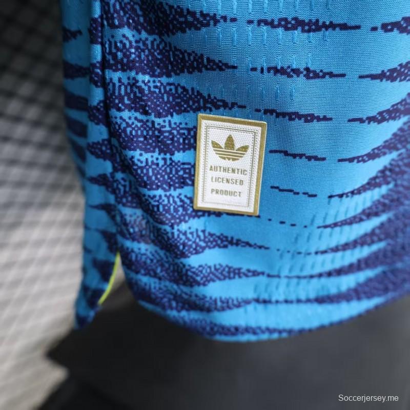 قميص لاعب طويل الأكمام من الإصدار 2027، بلون أزرق خارجي لمنتخب كولومبيا بنمط جاكار متموج
