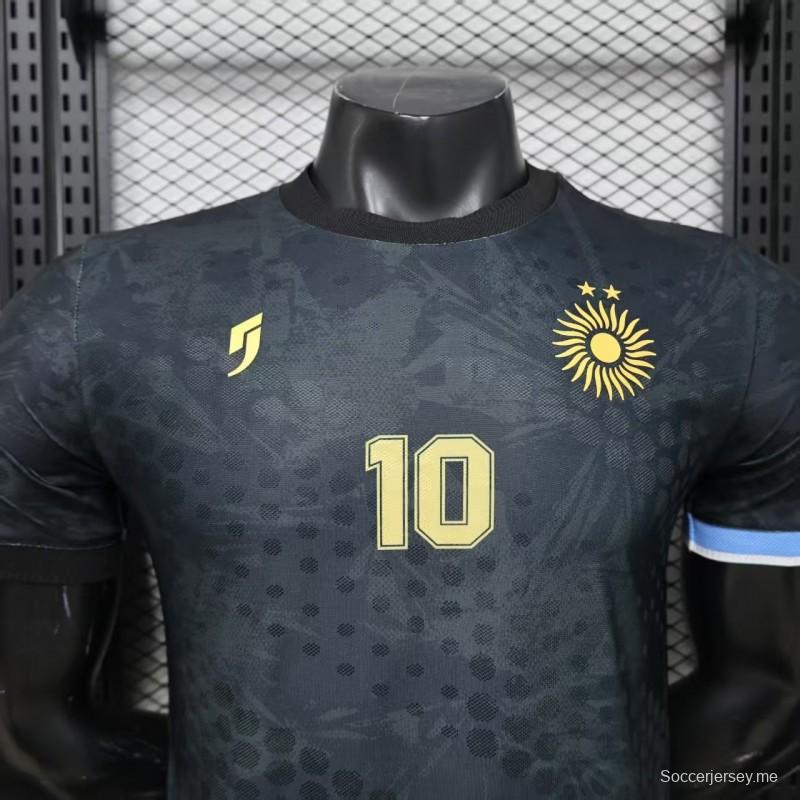 قميص اللاعب الإصدار 2026، طراز "أرجنتينا الأسود مع الشمس الذهبية"، الإصدار الخاص