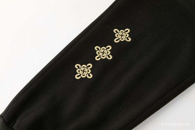 26/27 مانشستر يونايتد - بدلة رياضية سوداء بغطاء رأس وبنطال طويل