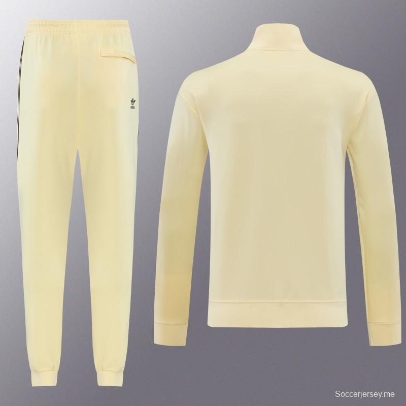 2026  سترة بأزرار كاملة + بنطال طويل من Adidas بلون المشمش