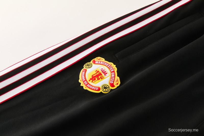 2026/27 مانشستر يونايتد - سترة رياضية سوداء بنمط "جرانج" وبقع طلاء، بسحاب كامل + بنطال طويل