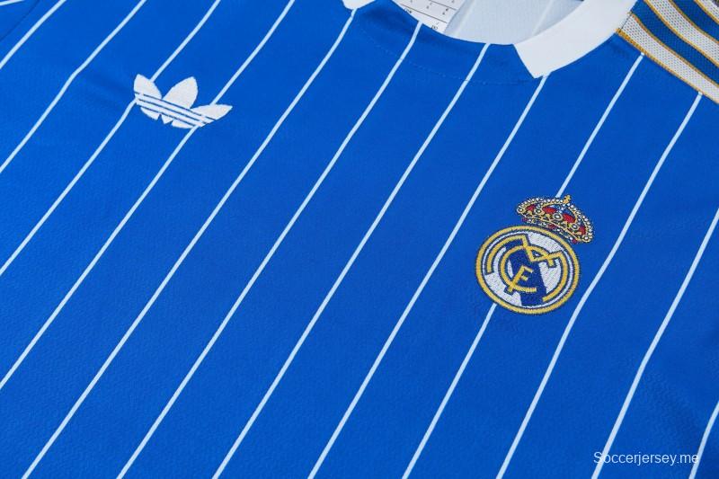 26/27 بدلة رياضية زرقاء من ريال مدريد بأكمام قصيرة + بنطال طويل