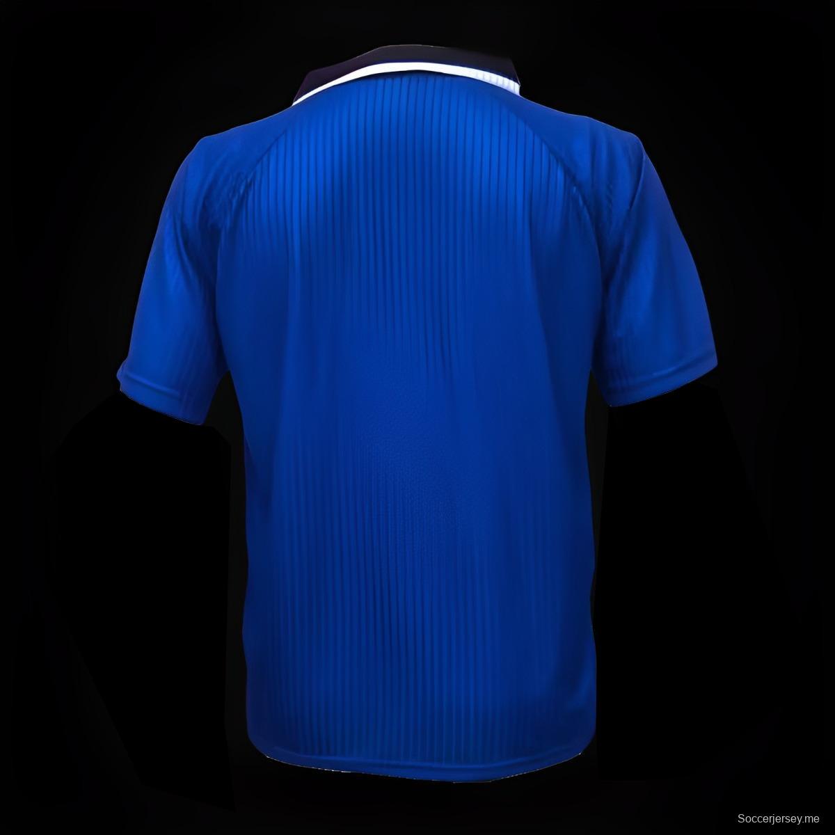 قميص أزرق عتيق 96/97 لمانشستر يونايتد خارج الديار أزرق اللون
