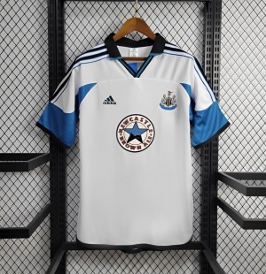ريترو 99/00 نيوكاسل يونايتد ذهاباً وإياباً جيرسيه أبيض
