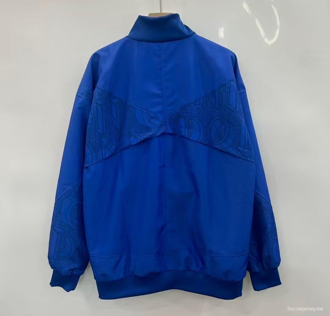 25/26 تشيلسي FC أزرق مع نمط نصي لندن على كامل السطح وسترة واقية من الرياح بسحاب كامل